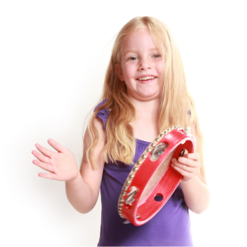 Young girl playing a tambourine 